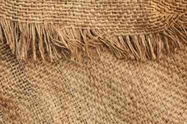 The frayed edge of a burlap sack. The frayed edge of a burlap sack.