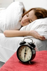 This woman will wake when the alarm goes off. This woman will wake when the alarm goes off.