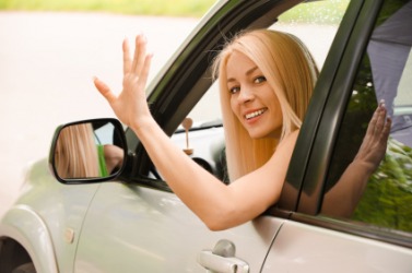 This woman's waving hand is an example of motion. This woman's waving hand is an example of motion.