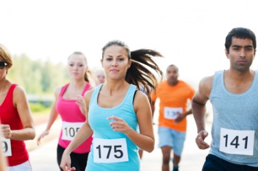A group of runners in a race. A group of runners in a race.