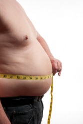 This man has a large belly. This man has a large belly.