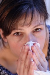 This woman suffers from a malady. This woman suffers from a malady.