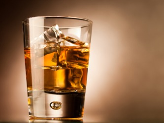 A glass of malt liquor. A glass of malt liquor.