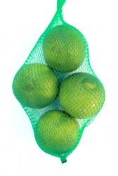 Limes in a bag made from netting. Limes in a bag made from netting.