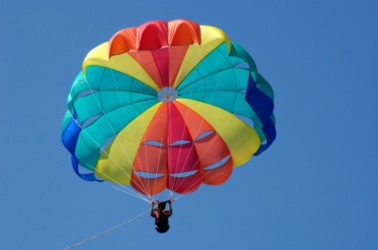 A skydiver under his parachute. A skydiver under his parachute.