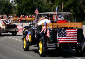 Vintage cars in a parade. Vintage cars in a parade.