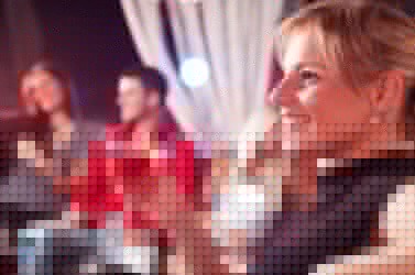 A woman partakes of a cocktail. A woman partakes of a cocktail.