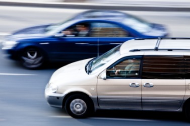 One car passes another. One car passes another.