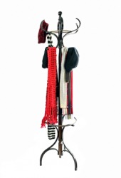 Scarves and hats on a rack. Scarves and hats on a rack.