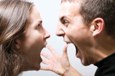 Two people expressing rage. Two people expressing rage.