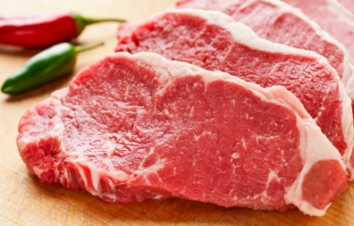 Three raw steaks. Three raw steaks.
