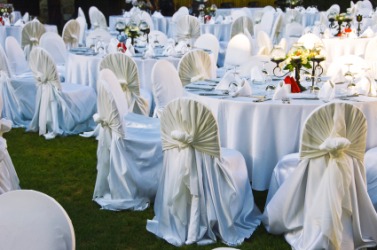 Tables set for a wedding reception. Tables set for a wedding reception.
