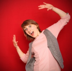 A woman recoils. A woman recoils.