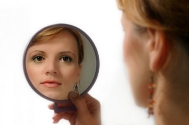 A mirror is a reflective surface. A mirror is a reflective surface.