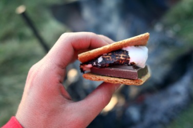 S'more made over a campfire. S'more made over a campfire.