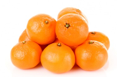 A pile of tangerines. A pile of tangerines.
