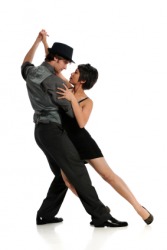 A couple dance the tango. A couple dance the tango.