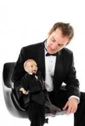 A ventriloquist with his puppet. A ventriloquist with his puppet.