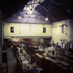 Old furniture in a warehouse. Old furniture in a warehouse.