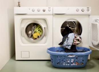 A busy washer and dryer on washday. A busy washer and dryer on washday.