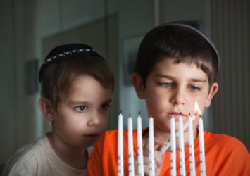 Two boys wearing yarmulkes. Two boys wearing yarmulkes.