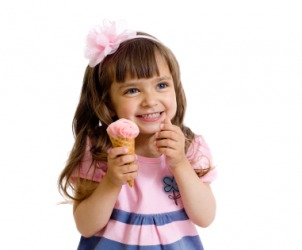 After a bite of ice cream, this child would say After a bite of ice cream, this child would say