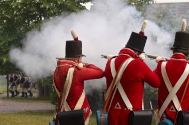 A reenactment of a battle in the War of 1812. A reenactment of a battle in the War of 1812.