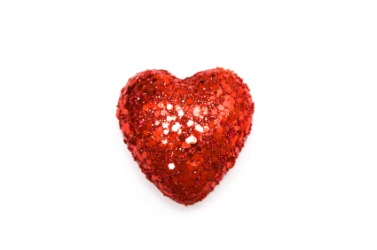 A bedazzled red heart. A bedazzled red heart.