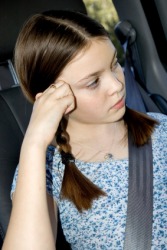 This girl is bored with the road trip. This girl is bored with the road trip.
