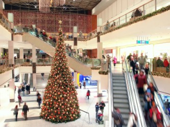 A bustling shopping mall. A bustling shopping mall.