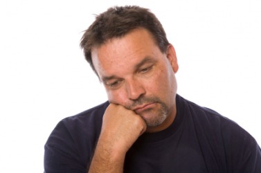 A man suffering with depression. A man suffering with depression.