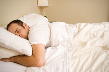 This man has lain down in his bed. This man has lain down in his bed.