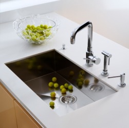 A shiny kitchen sink. A shiny kitchen sink.