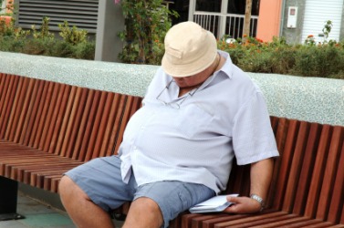 A man suffering with obesity. A man suffering with obesity.