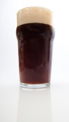 A glass of brown ale. A glass of brown ale.