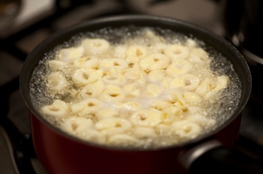 A seething pot of pasta. A seething pot of pasta.