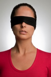A Woman Wearing A Blindfold A Woman Wearing A Blindfold